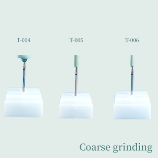 Three coarse grinding dental polishing tools T-004, T-005, T-006 on white stands